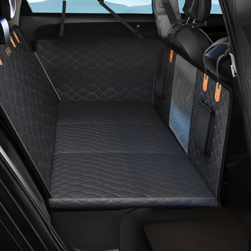 Car seat cover with a quilted design installed in a vehicle.