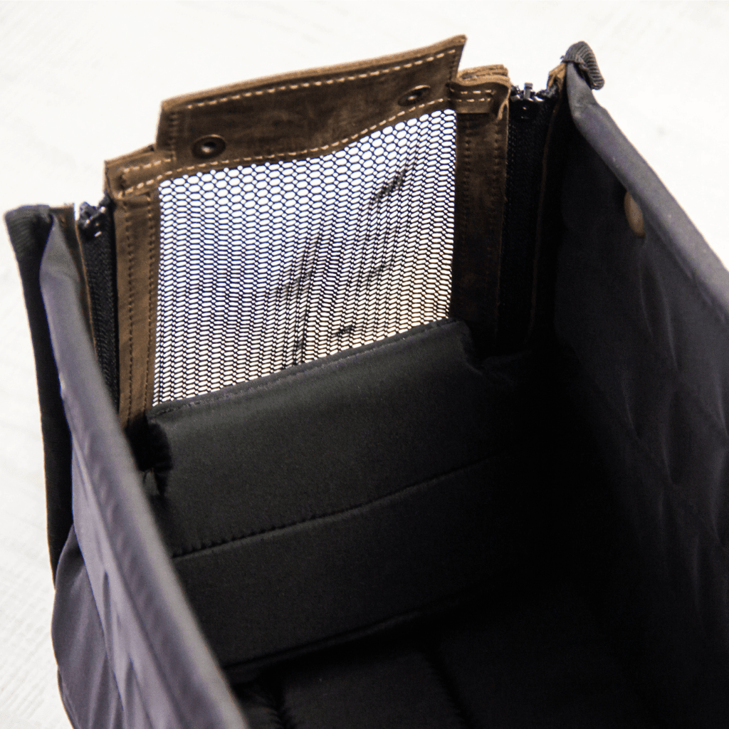 Stylish leather dog travel bag - premium genuine leather construction with adjustable straps
