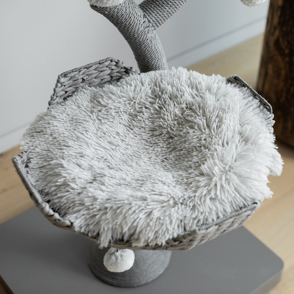 Tall cat scratching post tree with gray cushioned comfort platforms for large cats
