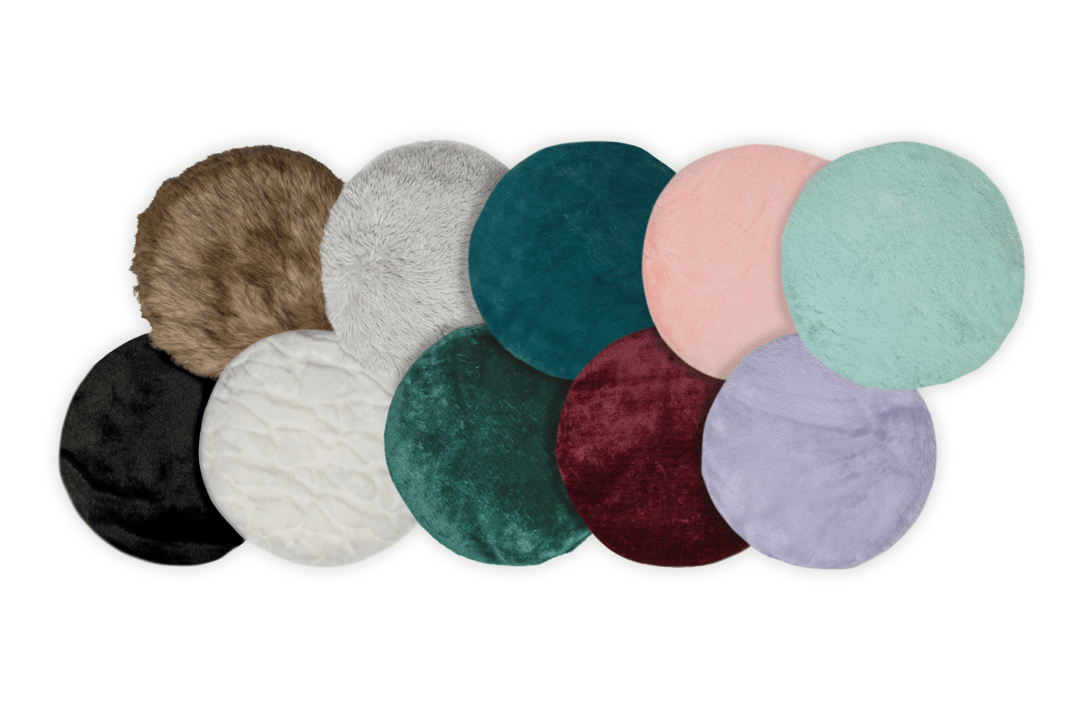 Set of round, plush coasters in various colors on a white background