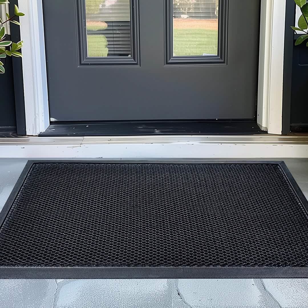 Large heavy-duty outdoor dog mat placed at entryway for muddy paws