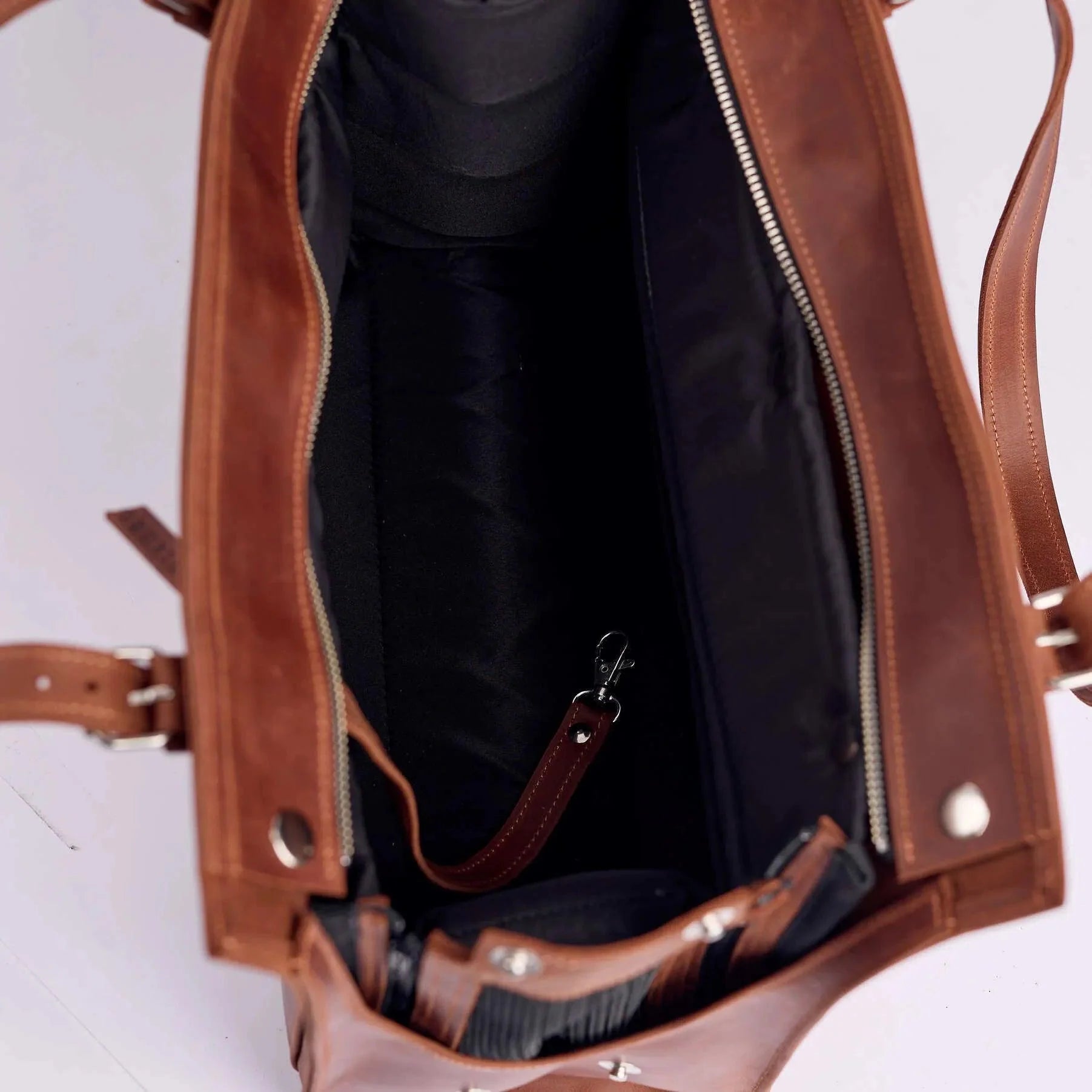 Cognac leather dog travel carrier - airline-compliant design with mesh ventilation
