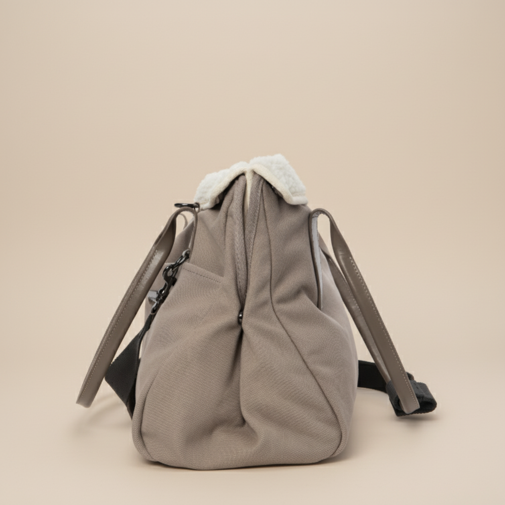 Portable dog tote carrier with multiple storage pockets for treats, toys, and pet essentials