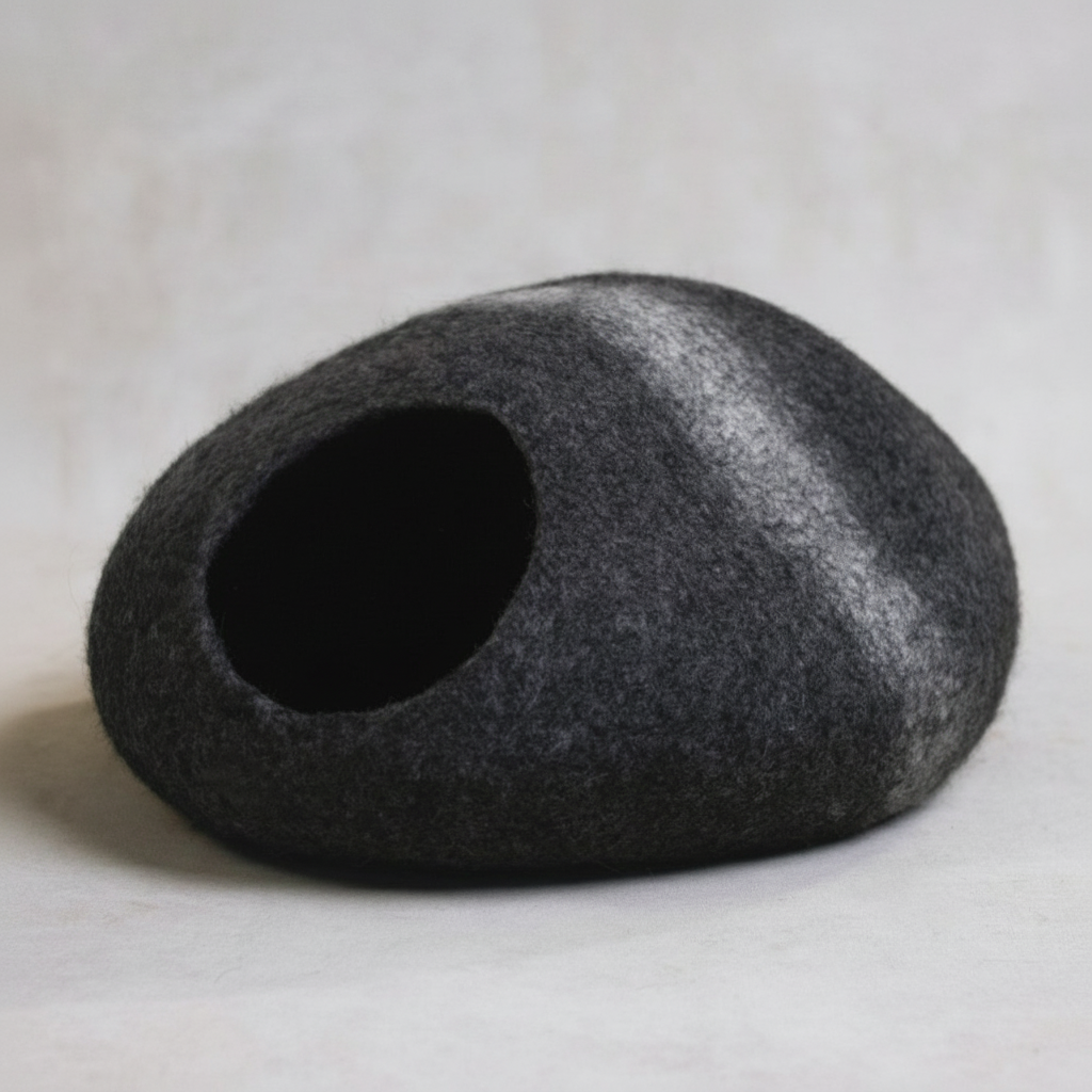 Modern cat bed cave with white stripe - side view showing entrance and felt construction
