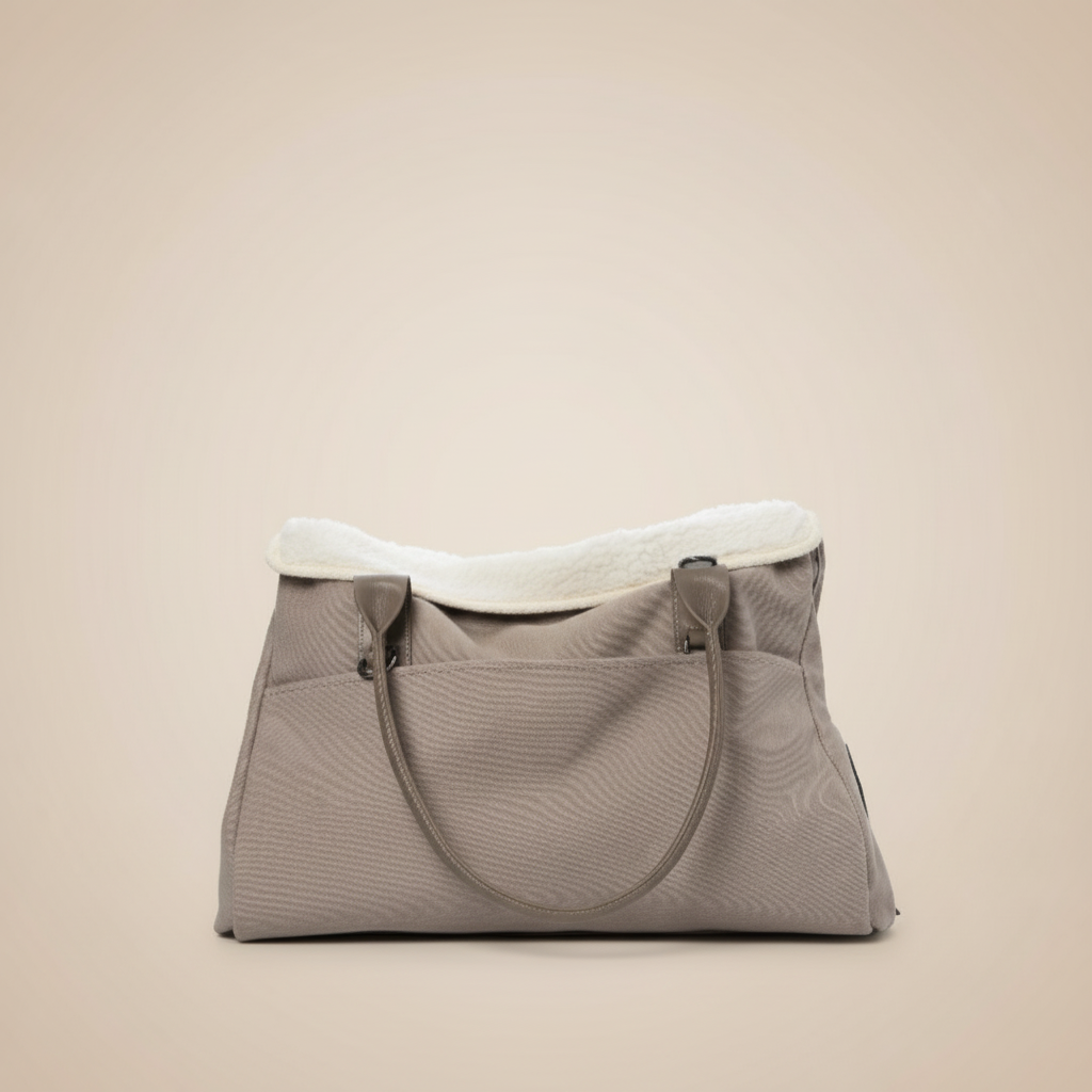 Premium dog tote carrier bag in beige with small dog inside, showing front view with multiple pockets and comfortable handles